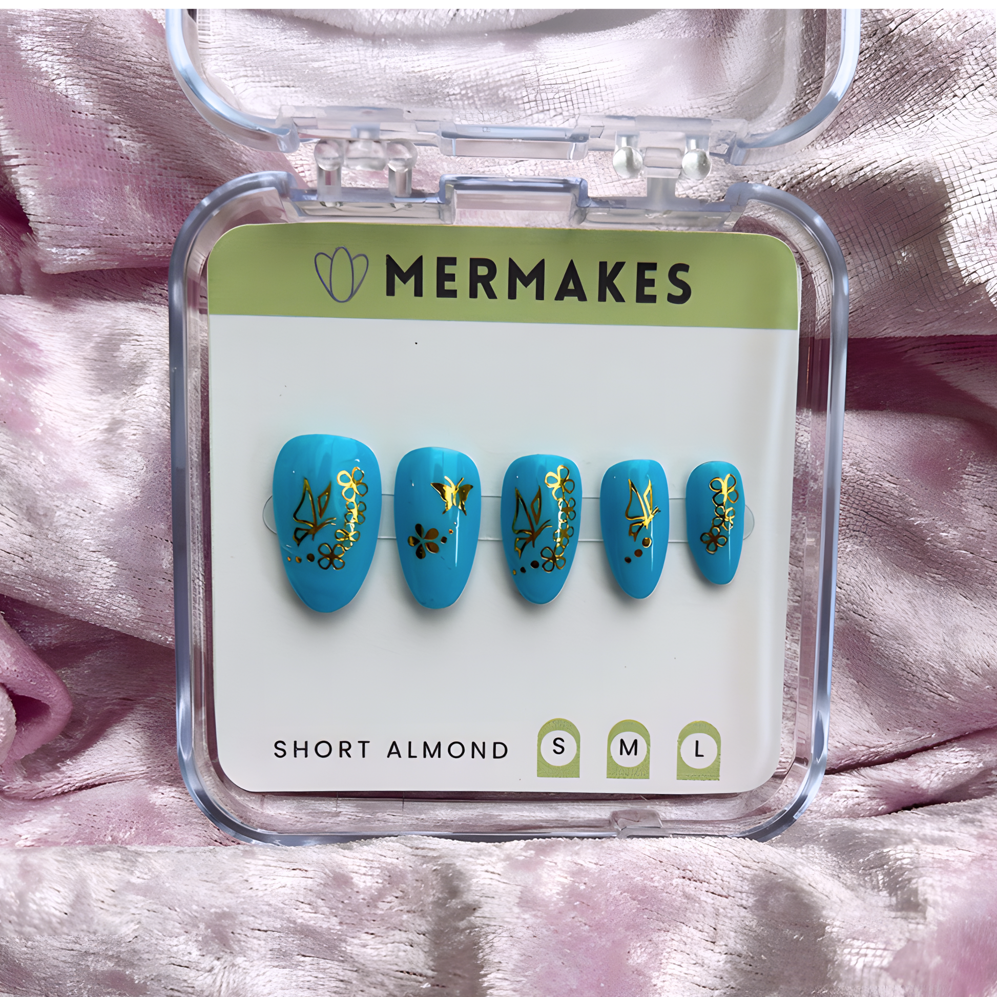 Blue press-on nails with metallic gold butterflies