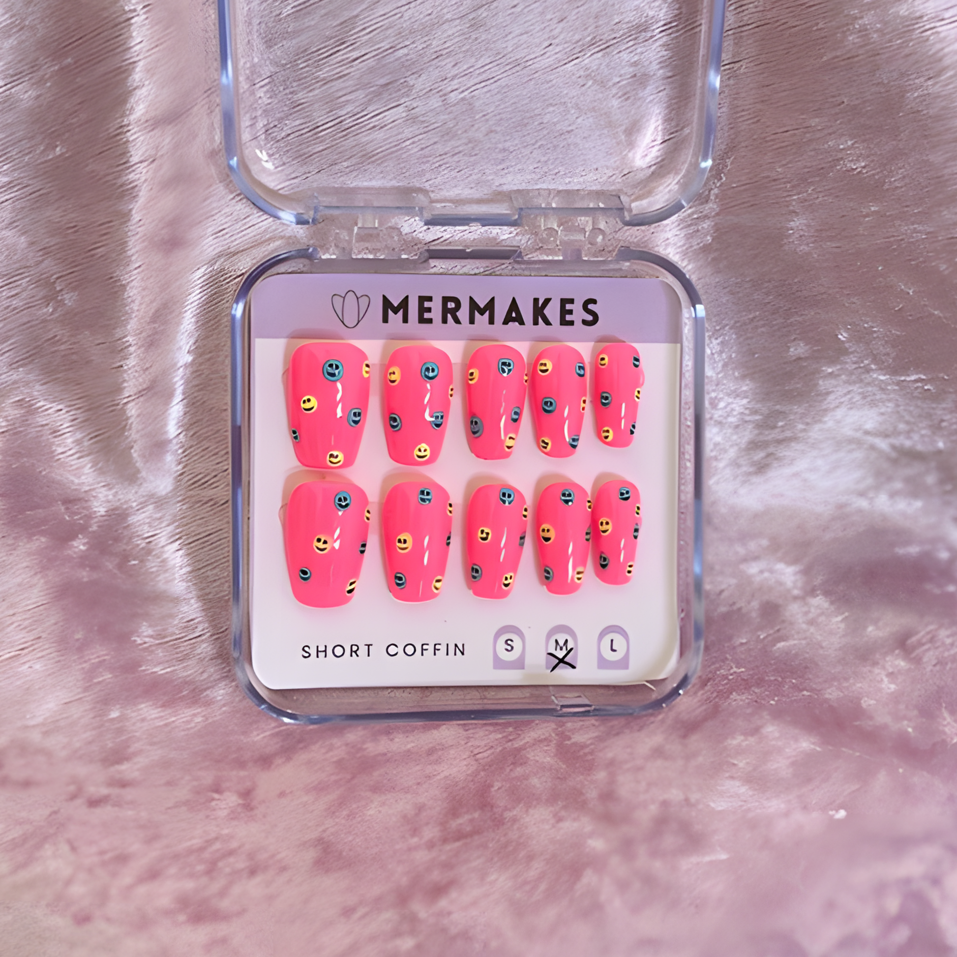 Glow in the dark neon pink smiley nails